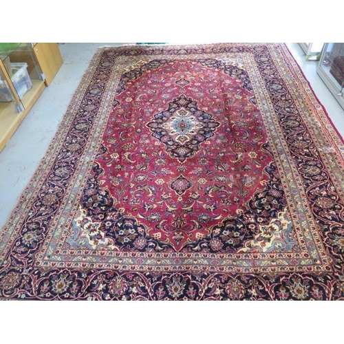 254 - A hand knotted woollen kashan rug, 3.60 x 2.42m