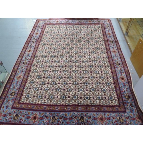 258 - A hand knotted woollen Mood rug, 2.86m x 2m, in good condition