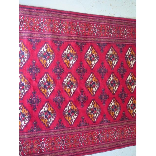 263 - A hand knotted woollen Turkman rug, 1.5m x 1.24m in good condition