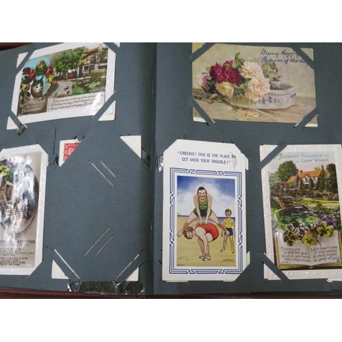 1106 - An early 20 century postcard album with topographical and humorous cards