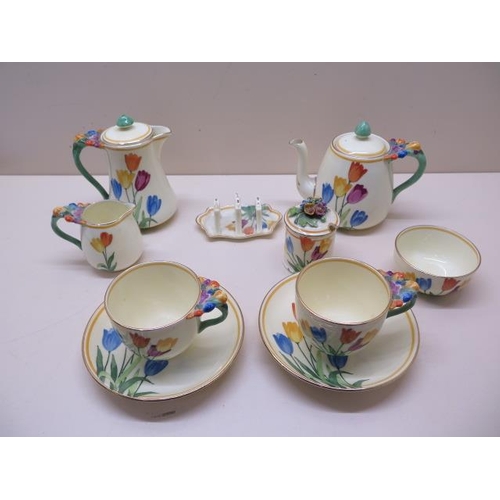 493 - A Crown Staffordshire tete a tete teaset with preserve pot and toast rack, all good apart from the w... 