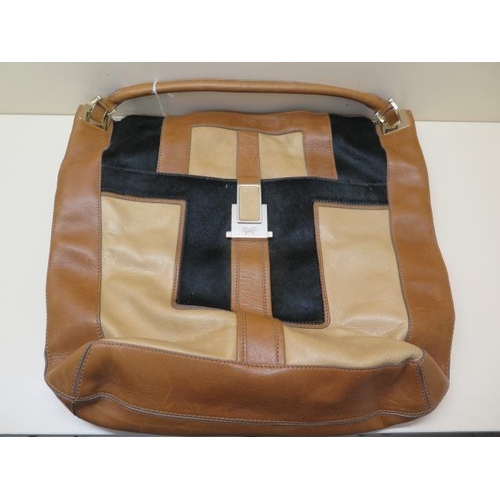 504 - A Anya Hindmarch, a tricolour leather bag, 40cm wide, some usage but generally good condition