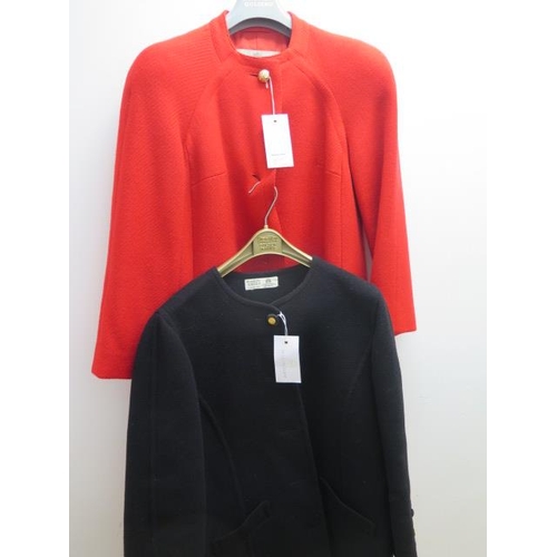 506 - A ladies Hardy Amies black wool coat and a ladies Aquascutum red wool coat, both with minor age rela... 