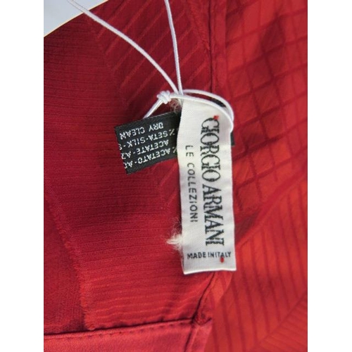 497 - A Giorgio Armani red silk scarf Le Collezioni, 155cm x 40cm, no obvious damage, no box