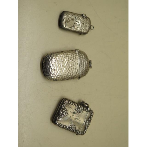 610 - Three silver vesta cases, largest 6cm, total weight approx 1.8 troy oz, smallest has small dents and... 