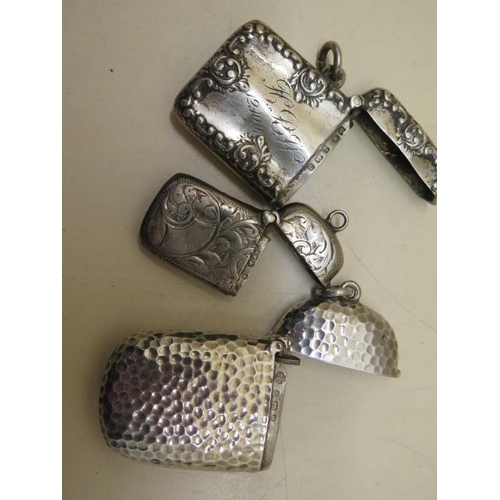 610 - Three silver vesta cases, largest 6cm, total weight approx 1.8 troy oz, smallest has small dents and... 