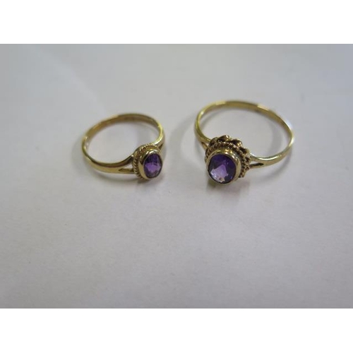 785 - Two hallmarked 9ct gold amethyst rings, size P and G, and a pair of 9ct gold amethyst earrings, mark... 