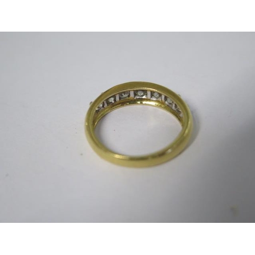 782 - An 18ct hallmarked yellow gold seven stone diamond ring, total ct 1.00, ring size N, approx 4.4 gram... 