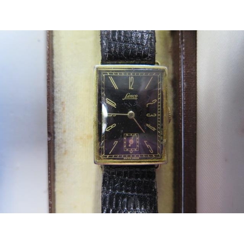 967 - Two gents swiss watches; a steel manual wind 35mm 21 jewels Excaliber and a gold plated 22mm x 34mm ... 