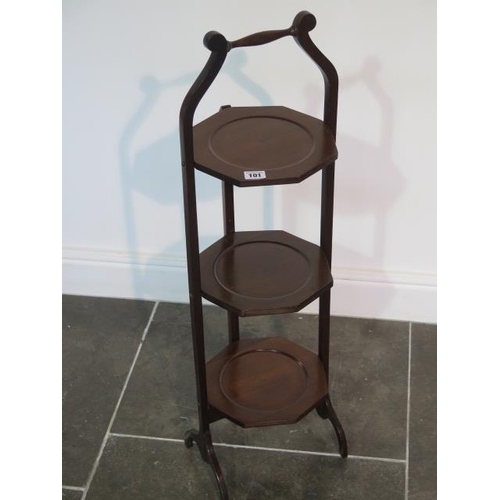 101 - A mahogany three tier folding cake stand with octagonal shelves, 88cm tall, very clean condition