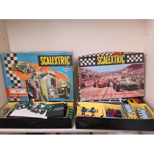 1051 - Two Scalextric boxed racing sets. Set 50 with 2 extra cars Ferrari C/62  and a Lotus RE C/63, and a ... 