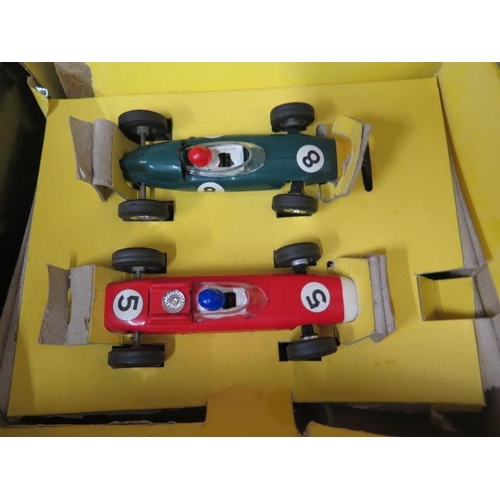 1051 - Two Scalextric boxed racing sets. Set 50 with 2 extra cars Ferrari C/62  and a Lotus RE C/63, and a ... 