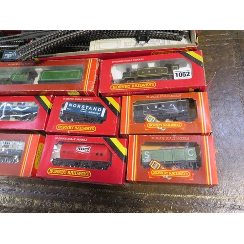 1052 - A Hornby 00 gauge railway, flying Scotsman loco, 0-6-0 tank loco, assorted rolling stock, track etc.... 