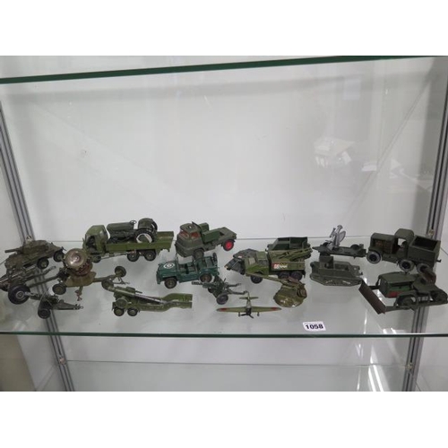 1058 - A collection of diecast and others military vehicles, all play worn and some repairs