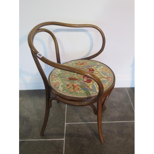 107 - A Thonet type bentwood open armchair, 78cm tall x 63cm wide