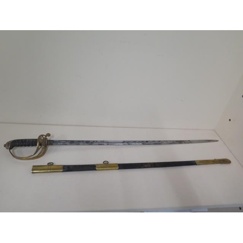 1074 - A Victorian naval sword and scabbard, sword length 89cm, some pitting and wear consistent with age