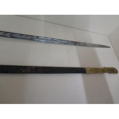 1074 - A Victorian naval sword and scabbard, sword length 89cm, some pitting and wear consistent with age