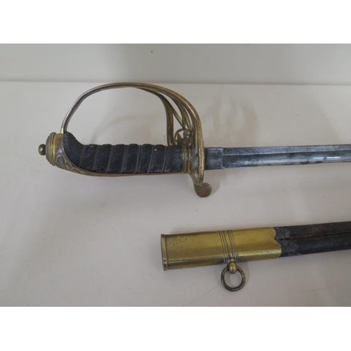 1074 - A Victorian naval sword and scabbard, sword length 89cm, some pitting and wear consistent with age