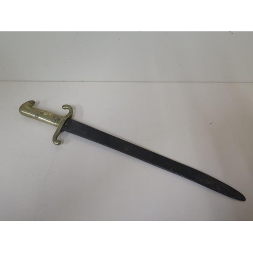 1079 - A 19th century hanger short sword with brass hilt, marked 76.A.4.31. with W and Crown 72 to blade, 5... 