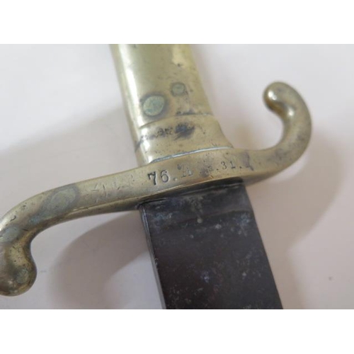 1079 - A 19th century hanger short sword with brass hilt, marked 76.A.4.31. with W and Crown 72 to blade, 5... 