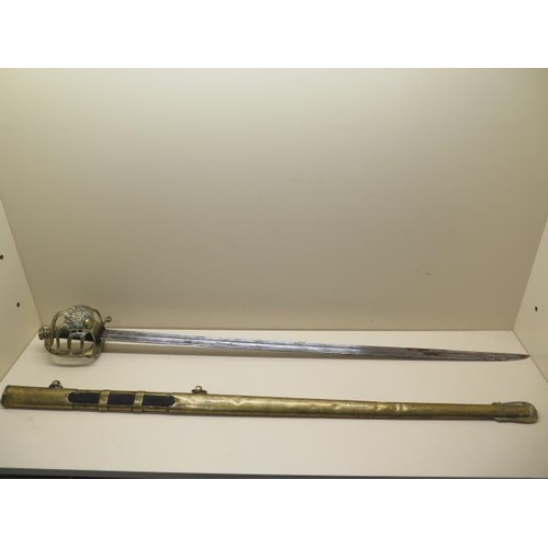 1085 - A 19th century French Grenadier officer's sword by Klinyenthal, with brass scabbard, the double full... 