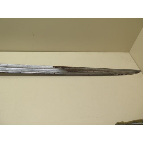 1085 - A 19th century French Grenadier officer's sword by Klinyenthal, with brass scabbard, the double full... 