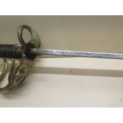 1085 - A 19th century French Grenadier officer's sword by Klinyenthal, with brass scabbard, the double full... 