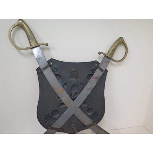 1097 - An Italian artillary shield and sword wall lamp, 54cm x 62cm