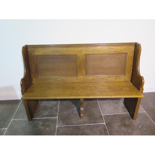 110 - An oak church pew, 92cm tall x 139cm wide x 52cm deep, a deep good colour and sturdy