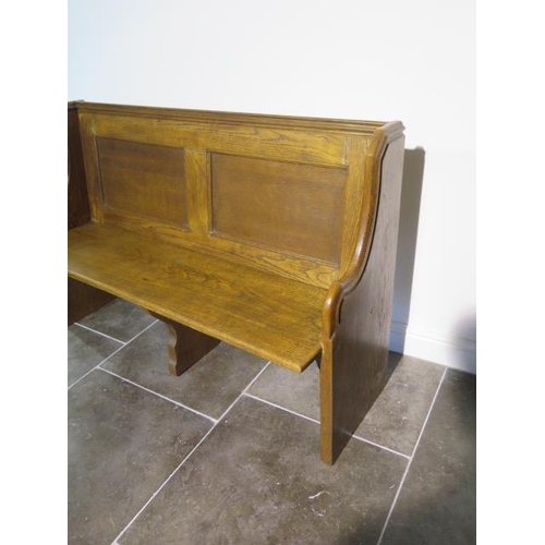 110 - An oak church pew, 92cm tall x 139cm wide x 52cm deep, a deep good colour and sturdy