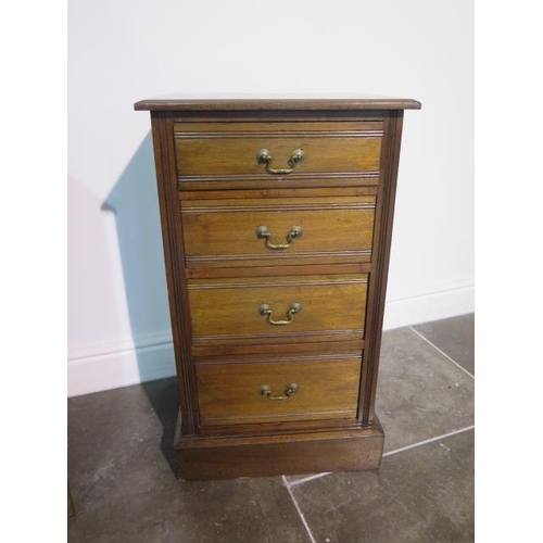 112 - A pair of late Victorian or Edwardian walnut bedside chests each with four graduated drawers with sw... 