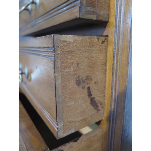 112 - A pair of late Victorian or Edwardian walnut bedside chests each with four graduated drawers with sw... 