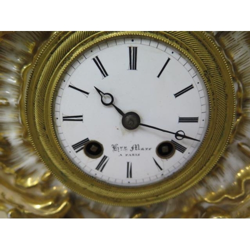 201 - A 19th century porcelain French clock by Henri Marc of Paris, 8 day movement with silk suspension, c... 