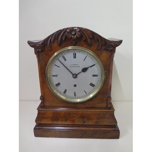 202 - An 8 day walnut table clock by J.Caney Cheapside London with a fusee movement, 33cm tall, running, s... 