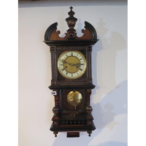 208 - An 8 day Austrian wallclock, strikes hours and half hours, 70cm tall with key, running