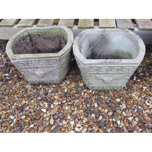 21 - A pair of stone effect garden planters, 27cm tall x 37cm wide