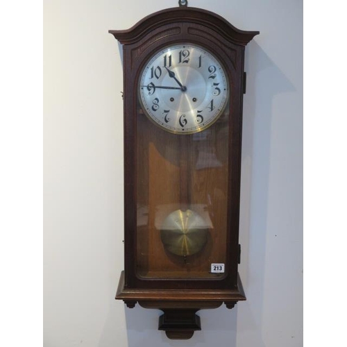 213 - An early 20th century oakcase wallclock, 8 day strikes hours/half, 87cm tall, in running order