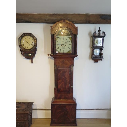 214 - An 8 day mahogany and inlaid longcase clock with a 12