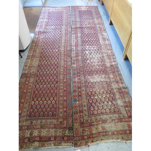 253 - A pair of hand knotted Persian runners, late 19th/early 20th century, red ground with geometric grad... 