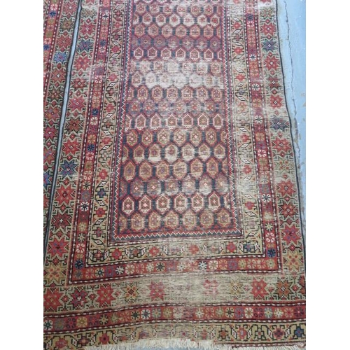 253 - A pair of hand knotted Persian runners, late 19th/early 20th century, red ground with geometric grad... 