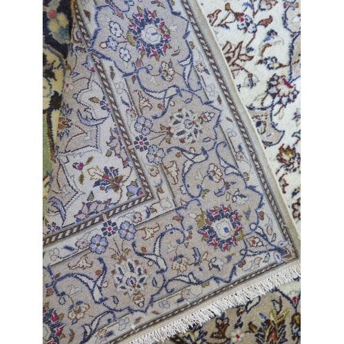 269 - A hand knotted fine Kashan woollen rug, 2.24m x 1.44m, in good condition