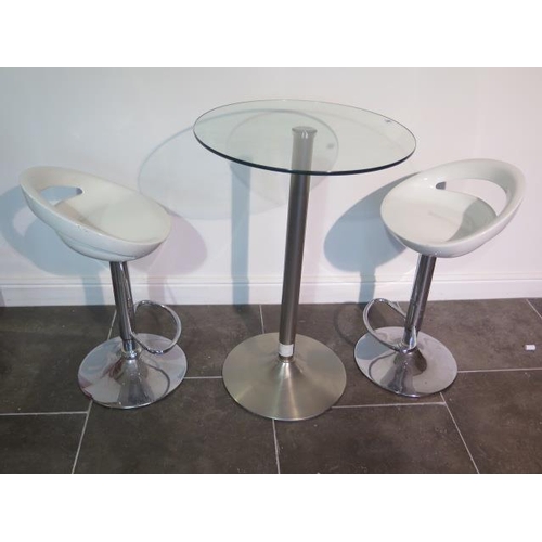 39 - A glass top bar table, 91cm tall, with two moulded white seats gas lift stools, some usage marks but... 