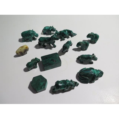 405 - A collection of eleven malachite and one other animal figures and two malachite boxes, largest anima... 