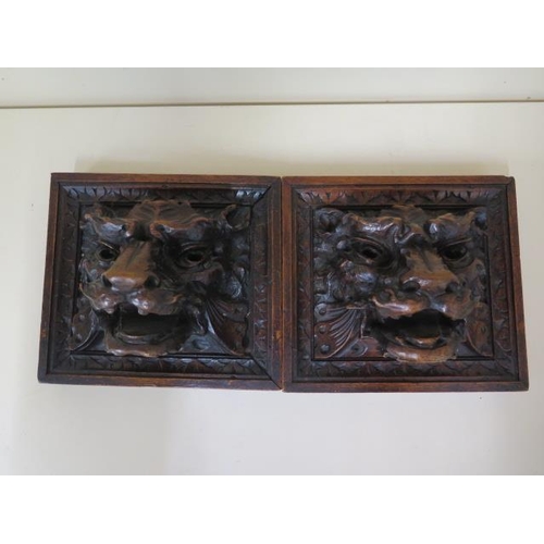 406 - A pair of well carved 18/19th century oak lions head mounts, 19cm x 21cm x 12cm, in good condition w... 