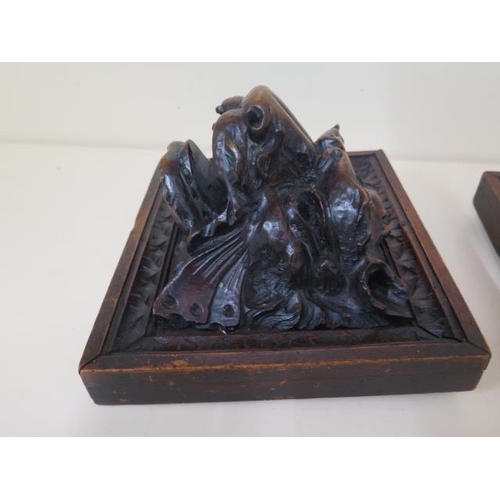 406 - A pair of well carved 18/19th century oak lions head mounts, 19cm x 21cm x 12cm, in good condition w... 