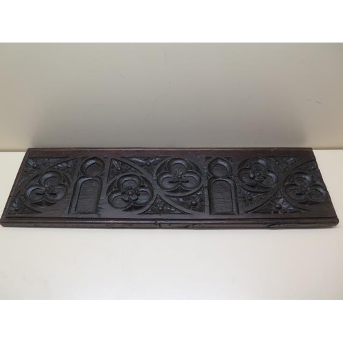 407 - An 18th century carved Gothic oak panel, initialled FH to the back, 73cm x 21cm x 2.5cm PLEASE NOTE ... 