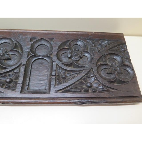 407 - An 18th century carved Gothic oak panel, initialled FH to the back, 73cm x 21cm x 2.5cm PLEASE NOTE ... 