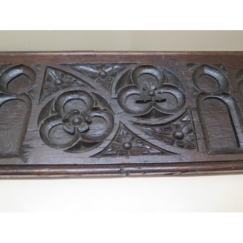 407 - An 18th century carved Gothic oak panel, initialled FH to the back, 73cm x 21cm x 2.5cm PLEASE NOTE ... 