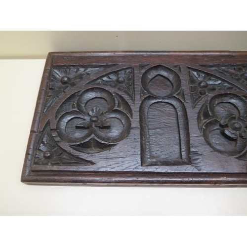 407 - An 18th century carved Gothic oak panel, initialled FH to the back, 73cm x 21cm x 2.5cm PLEASE NOTE ... 