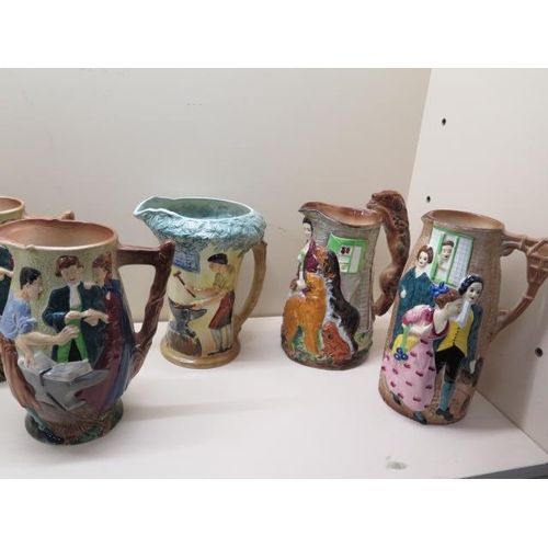 411 - Seven Burleigh ware moulded figural jugs, all good condition apart from a star crack to base of vill... 